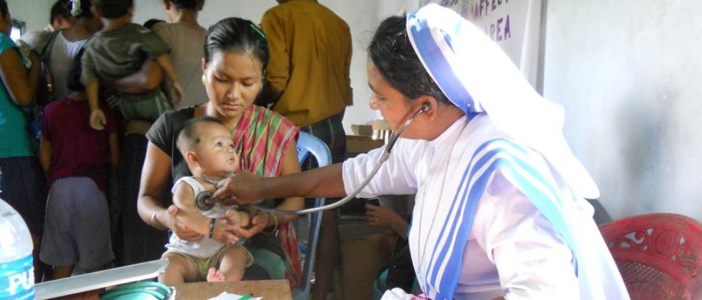 Examination of a child as part of the medical camps